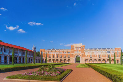 Facade of historic building against blue sky