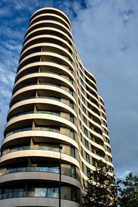 Low angle view of modern building against sky