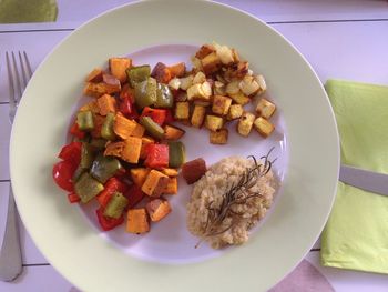 High angle view of chopped fruits in plate