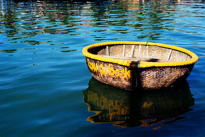 Reflection of boat in lake