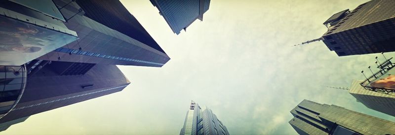 Low angle view of modern buildings against sky