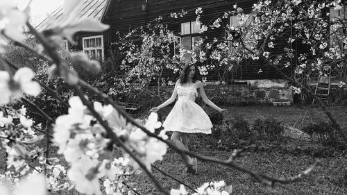 Woman walking on flower tree