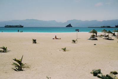 Scenic view of beach against sky