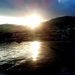 Scenic view of river at sunset