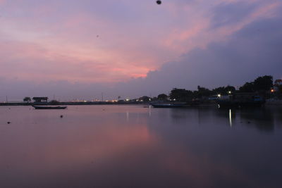 Scenic view of sea against sky at sunset