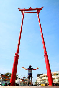 Man being impressed by the giant swing or sao ching cha,  bangkok, thailand