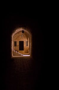 Illuminated corridor of building