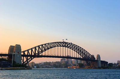 View of bridge in city against clear sky