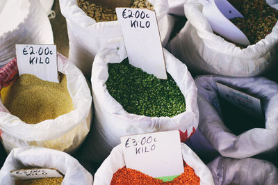 High angle view of various food in sack for sale in market