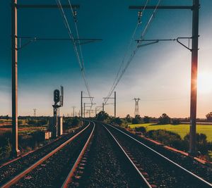 Electricity pylon and train tracks