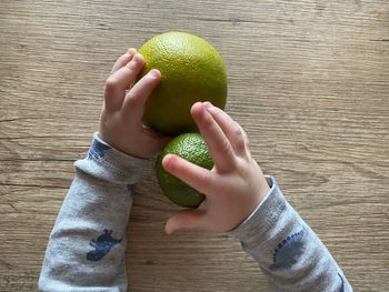 Close-up of hand holding fruit