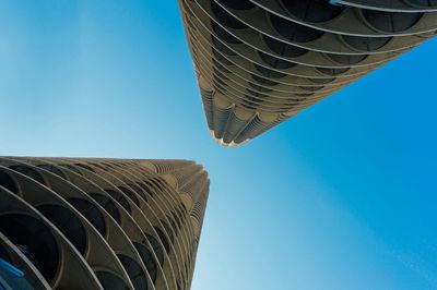 Low angle view of building against clear blue sky