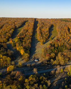 Aerial view of a ski resort in new york on a cold fall morning