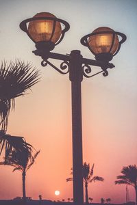 Low angle view of illuminated lamp post