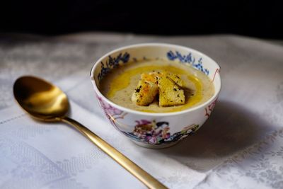 Close-up of soup in bowl on table