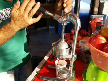 Close-up of man preparing food