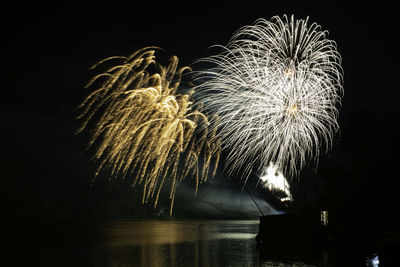 Firework display at night