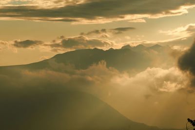 Scenic view of mountains against sky during sunset