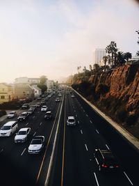 Road in city against sky