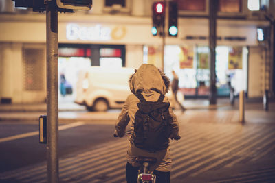 Woman standing at night