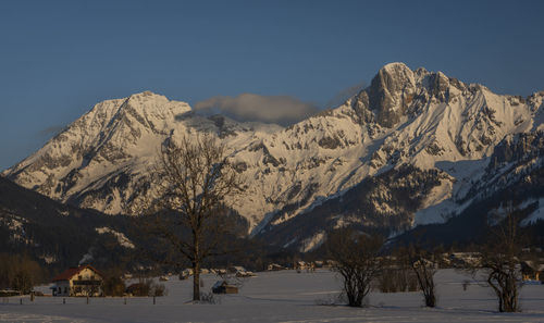 Scenic view of snowcapped mountains against sky