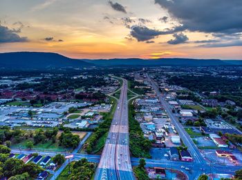 High angle view of cityscape against sky during sunset