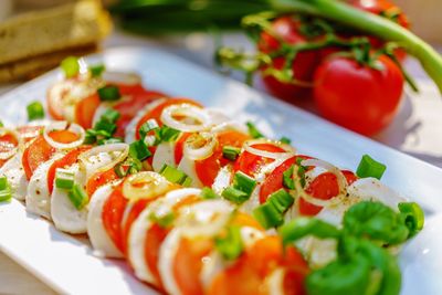 Close-up of salad served on table
