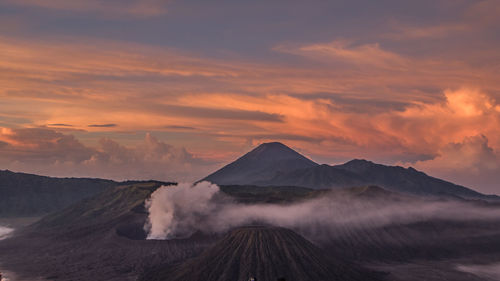 View of volcanic mountain against cloudy sky