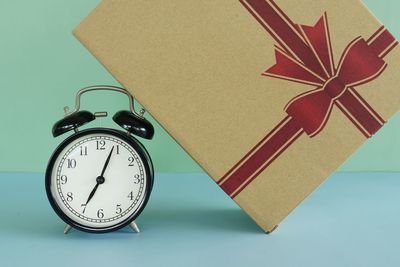 High angle view of alarm clock on table