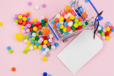 High angle view of multi colored candies on table