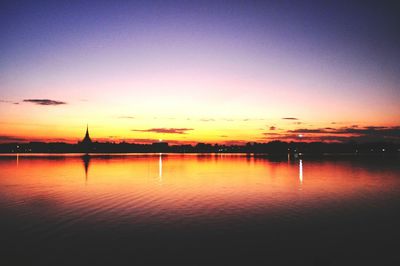 Scenic view of sea against romantic sky at sunset