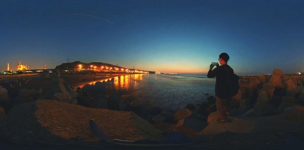 People on beach at night