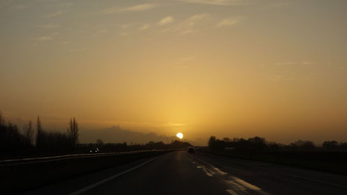 Road against sky during sunset