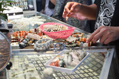 Close-up of hands for sale at market