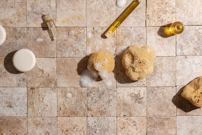 High angle view of cookies on tiled floor