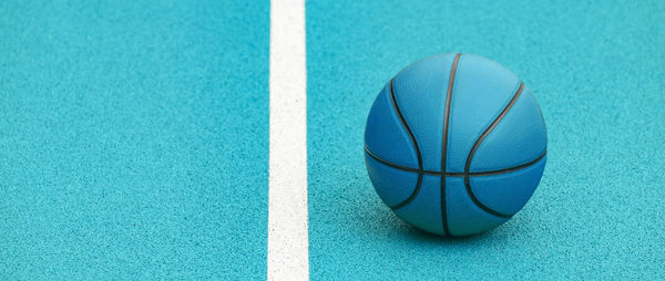 Close-up of basketball on court