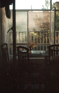 Reflection of glass window on table in restaurant