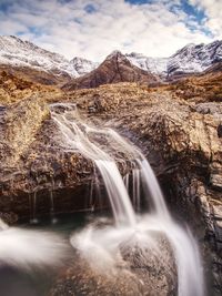 Rapids and small waterfall on the river coe, glencoe mountain, scotland , united kingdom,