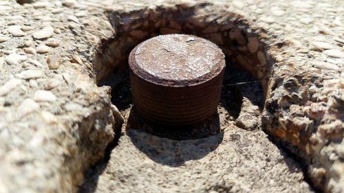 High angle view of rock on wall