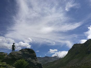 Scenic view of mountain against cloudy sky