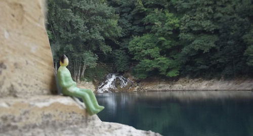 View of lake with trees in background