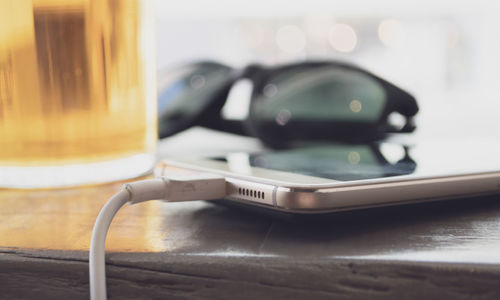 Close-up of mobile phone on table