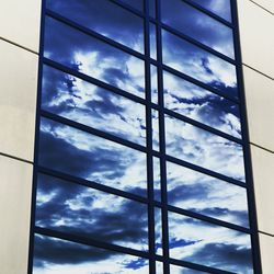 Low angle view of sky seen through window