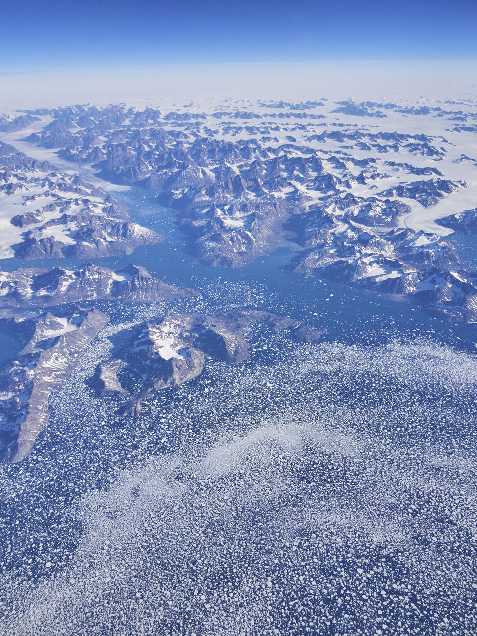 HIGH ANGLE VIEW OF SNOW COVERED LANDSCAPE