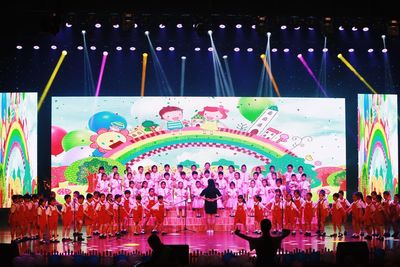 Crowd in illuminated room