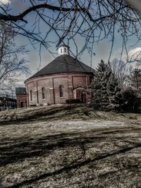 Abandoned house against sky