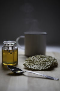 Close-up of jar on table