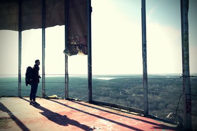 Woman fishing in sea