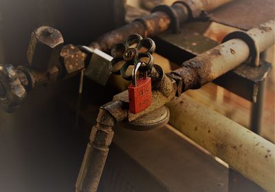 Close-up of padlocks on railing