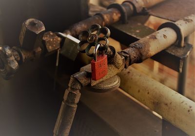 Close-up of padlocks on valve